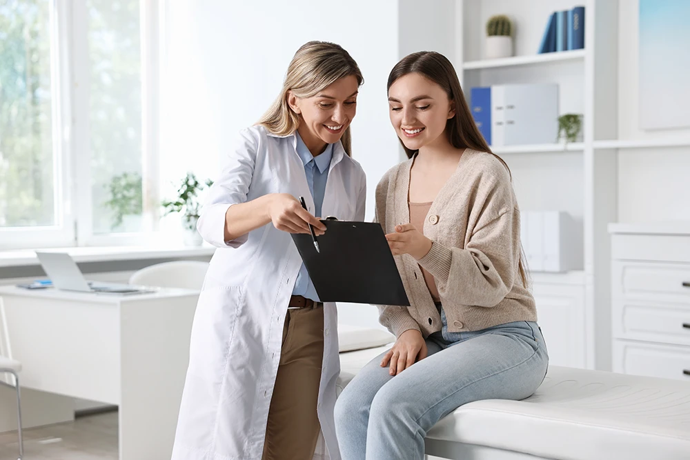woman doctor with woman patient
